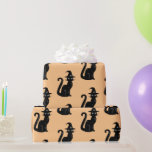 Cute Black Cat Orange Halloween Kids Wrapping Paper<br><div class="desc">This cute kids wrapping paper is perfect for Halloween or a birthday in October. This fun design features a pattern with a light orange background and a black cat with a hat on.</div>