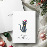 Cute Black Cat Xmas Cards<br><div class="desc">Send merry wishes with these cute Xmas cards featuring a playful black cat in festive style. This 5x7 greeting card for Christmas showcases a charming watercolor illustration of Samantha the kitty, complete with a Santa hat and holiday bauble. The punny message “Happy Paw-lidays” is set in a fun script with...</div>
