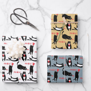 Cute black cats playing with hearts and meow wrapping paper sheet