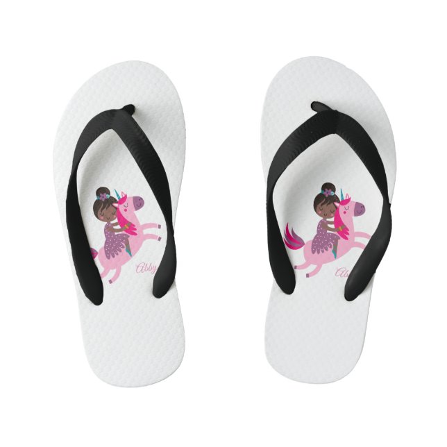 Cute Black Haired Girl Riding on a Unicorn Kid's Jandals (Footbed)