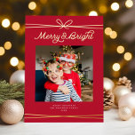 Cute Bow Merry & Bright Photo Red   Gold<br><div class="desc">This modern holiday photo card features one square photo, festive red background, and a string bow with the greeting "Merry & Bright" in gold foil. This design accommodates a single square photo (you can add more photos to the back). On the reverse side is the same red background, to which...</div>