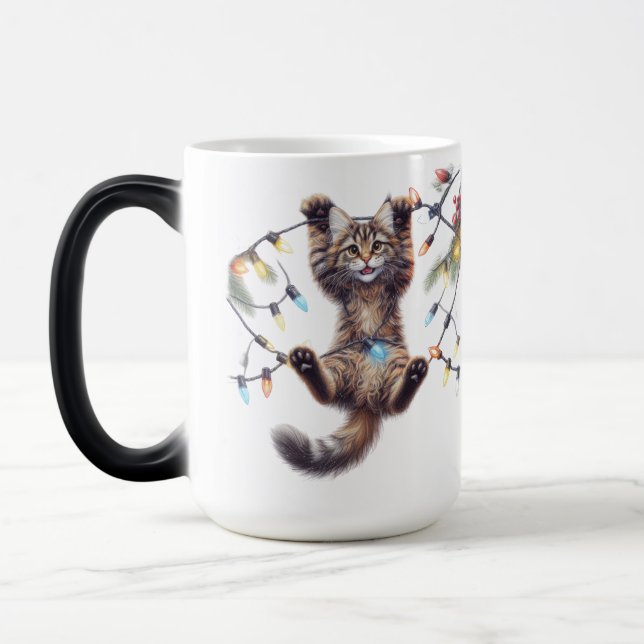 CUTE BROWN TABBY CAT HANGING FROM LIGHTS MAGIC MUG (Left)