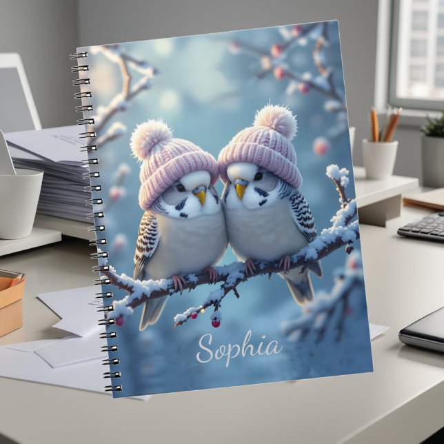 Cute budgies with bobble hats on a branch notebook (Creator Uploaded)