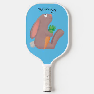 Cute bunny rabbit sitting with carrot cartoon pickleball paddle
