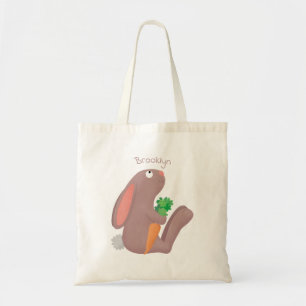 Cute bunny rabbit sitting with carrot cartoon tote bag