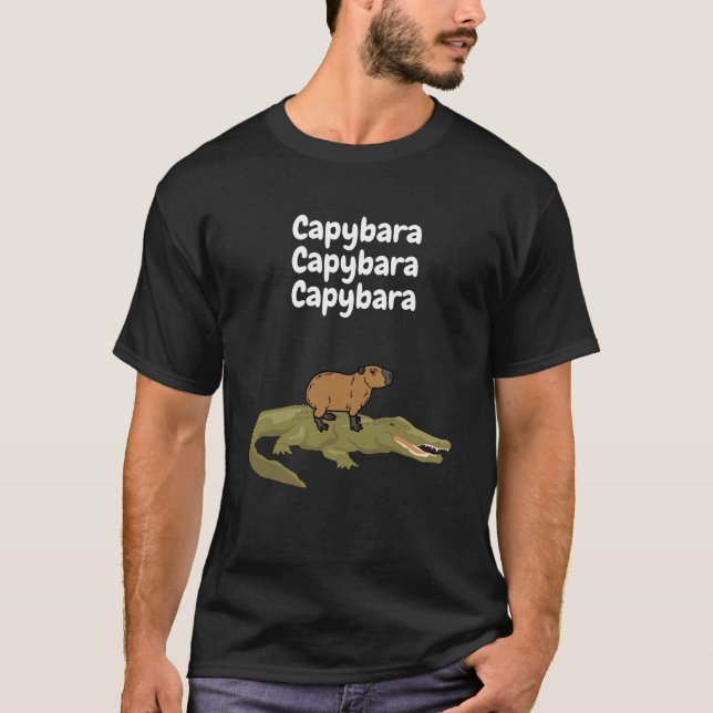 Cute Capybara riding on an alligator back t-shirt  (Front)