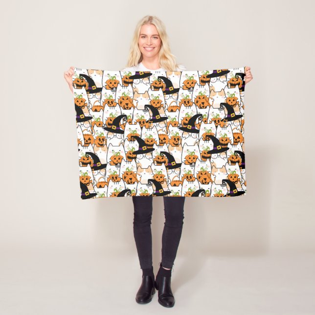 Cute Cat Witch Holding Bumkin Halloween Fleece Blanket (In Situ)