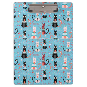 Cute cats pattern on a blue background clipboard