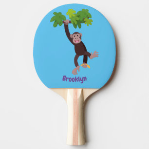 Cute chimpanzee in jungle hanging cartoon ping pong paddle