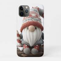 Cute Christmas Gnome with a Candy Cane on a Log