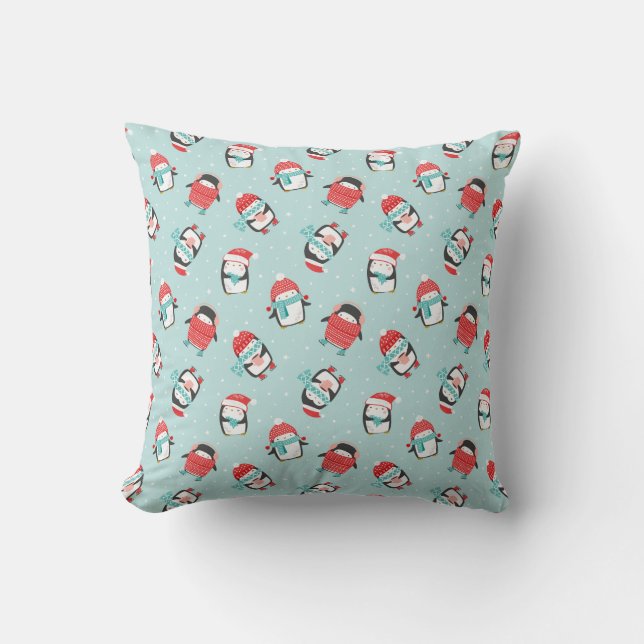 Cute christmas penguins on light blue cushion (Front)