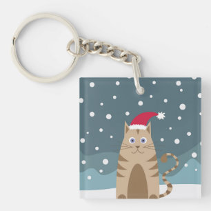 Cute christmas pet animal cat in snowy landscape key ring