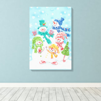 Cute Christmas Snowman Family in the Snow Canvas Print