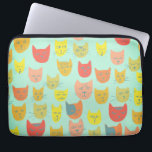 Cute colourful cat heads pattern green laptop sleeve<br><div class="desc">Cute colourful cat heads dance across this pattern,  check my shop for more items!</div>