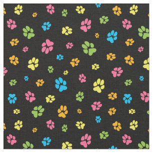 Cute colourful dog paw prints pattern on black fabric