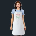 Cute Colourful Modern Christmas Apron<br><div class="desc">Modern Christmas apron featuring a cute and fun design with "Merry and Bright" in cheerful pastel pink and green casual lettering.</div>