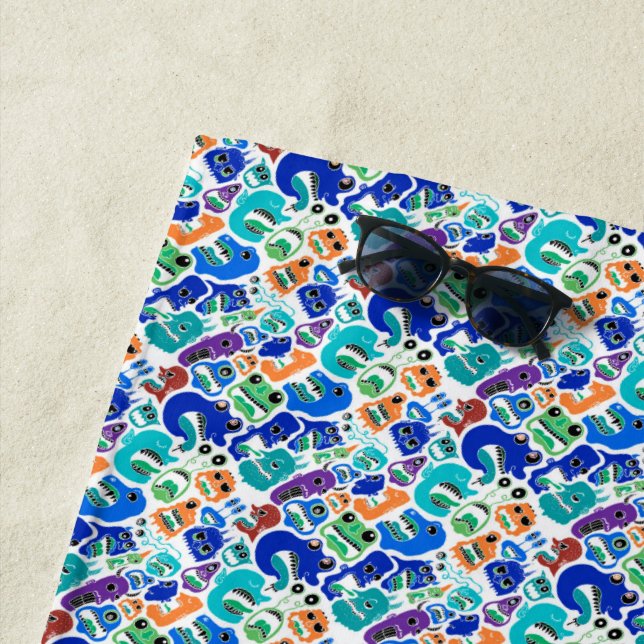 Cute colourful monsters face patterns beach towel (In Situ)