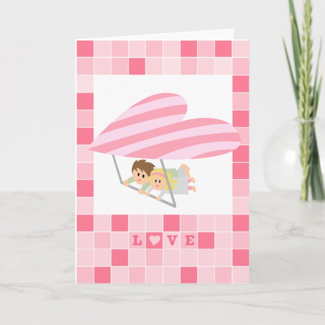 Cute couple flying on a heart-shaped hang-glider holiday card (Front)