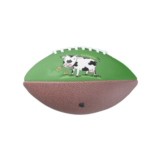 Cute cow in green field cartoon illustration football (Rotated 270)