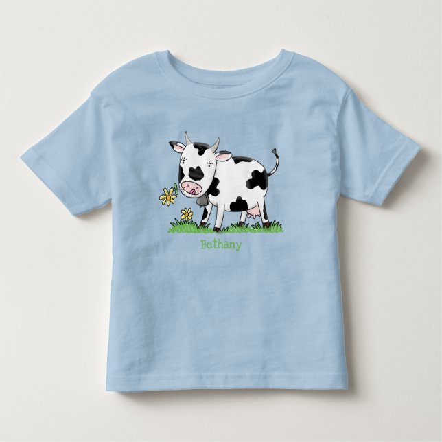 Cute cow in green field cartoon illustration toddler T-Shirt (Front)