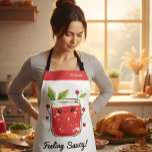 Cute Cranberry Sauce – Funny Kawaii Cooking  Apron<br><div class="desc">Bring a splash of humour into the kitchen with this adorable cranberry sauce apron featuring a smiling jar of sauce surrounded by berries and leaves. The playful “Feeling Saucy!” phrase adds charm, making it a fun choice for Thanksgiving cooks, holiday bakers, or anyone who loves a lighthearted kitchen vibe. With...</div>