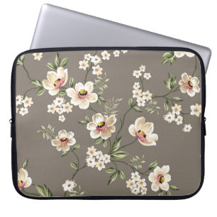 cute cream flowers with green leaves pattern on br laptop sleeve