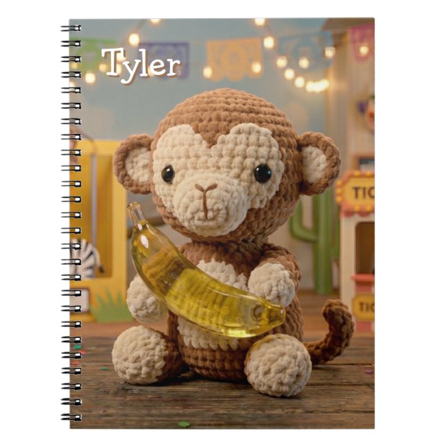 Cute Crocheted Monkey Holding a Banana at the Zoo Notebook (Front)