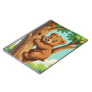 Cute cub bear climbing a tree notebook
