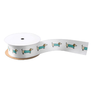 Cute dachshund in mint blue satin ribbon
