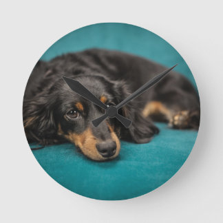 Cute Dachshund Laying Down Round Clock