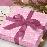 Cute December Winter Season Holiday Wordart Wrapping Paper<br><div class="desc">Cute white coloured Christmas holiday Merry Christmas wordart text pattern design on a classic light bright pink background colour. Vintage,  funky,  modern hipster designs for the lover of winter and December holiday themes. Fun paper sheets for wrapping those fun December surprise gifts or Christmas presents with.</div>