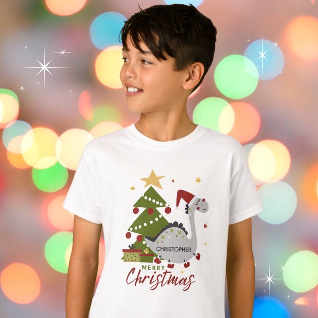 Cute Dinosaur and Christmas Tree Kid's Name T-Shirt (Personalize and make it your own. Available in multiple apparel styles, colors and sizes. )