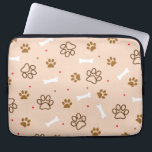 Cute dog pattern with paws bones tiny polka dots laptop sleeve<br><div class="desc">Sweet and cute design featuring dark brown dog paws,  white bones,  red and dark brown polka dots. Light brawn background. Perfect for the dog lover.</div>