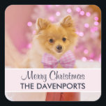 Cute Dog with Pink Bow Merry Christmas Photo Square Sticker<br><div class="desc">Stickers with an adorable Christmas dog wearing a cute pink plaid bow tie. This tiny little pet is sitting inside a whimsical hat box. A white tree decorated with pink lights in the background. The lights are blurred giving it a magical bokeh effect. Darling Christmas themed photograph. Perfect for dog...</div>