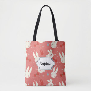Cute easter bunnies on red background pattern tote bag