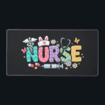 Cute Easter Nurse Medical Humor Desk Mat<br><div class="desc">Colorful lettering with a nurse hat,  stethoscope,  flowers and playful medical symbols. A cheerful graphic celebrating caring nurses and healthcare professionals during the Easter season with a bright and friendly hospital atmosphere.</div>