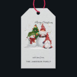 Cute Festive Gnomes and Snowman Merry Christmas  Gift Tags<br><div class="desc">A lovey Christmas holiday gift tag, perfect for the festive season. Featuring two gnomes, with one sitting on a large snowball, a happy snowman and Christmas tree, the script text above reads "Merry Chritmas". Underneath, in modern typography you can customise the gift tag with your family name using the Personalise...</div>