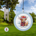 Cute Floral Highland Cow Winter Christmas Wind Chime<br><div class="desc">Cute Floral Highland Cow Winter Christmas Festive Holiday Wind Chime features a cute highland cow standing in the snow wearing a floral crown with a background of snowflakes with the text "Merry Christmas" in modern script typography. Perfect for Christmas and Holiday gifts. Designed by ©2024 Evco Studio www.zazzle.com/store/evcostudio</div>