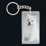 Cute Fluffy Japanese Spitz Puppy Key Ring<br><div class="desc">Adorable happy ball of fluff sitting on a grey couch.</div>