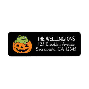 Cute Frog in Halloween Pumpkin