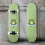 Cute Frog  Skateboard<br><div class="desc">A green skateboard with an illustration of a cute frog on its pond and customisable text below: a perfect gift for a kid! You could also use them for home decoration or to have fun during your skate sessions!</div>