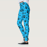 Cute Fun Black on Bright Sky Blue Paw Prints Leggings<br><div class="desc">These fun leggings are perfect for dog and cat lovers. They feature a cute pattern with black paw prints scattered over a bright sky blue or azure coloured background. Fun whimsical design is perfect for pet parents and animal lovers.</div>