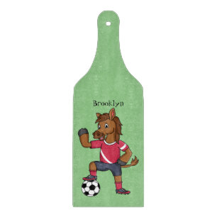 Cute funny horse playing soccer cartoon cutting board