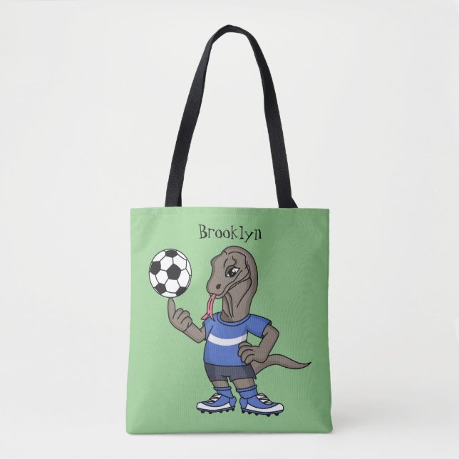 Cute funny Komodo dragon playing soccer cartoon Tote Bag (Front)