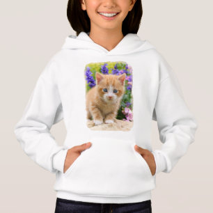 Cute Ginger Cat Kitten in a Flowery Garden -