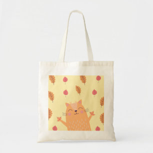 Cute Ginger Orange Cat Playing in Autumn Leaves Tote Bag