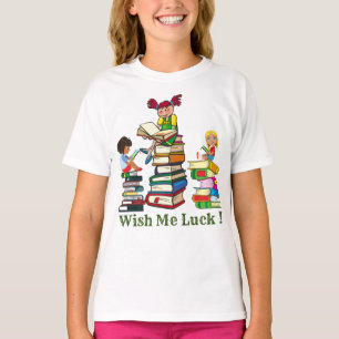 Cute girls sitting on a pile of books and reading T-Shirt