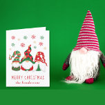 Cute Gnomes Merry Christmas Holiday Card<br><div class="desc">Cute personalised folded holiday card featuring three Scandinavian-style gnomes with seasonal red and green hats and tunics under red,  green and gold snowflakes. Personalise the "Merry Christmas" greeting (e.g.,  "Happy Holidays") in fun red typography and your name at the bottom. Add a message inside or leave blank.</div>