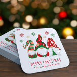 Cute Gnomes Merry Christmas Square Paper Coaster<br><div class="desc">Cute personalised coasters for your Christmas holiday tableware or Christmas party featuring three Scandinavian-style gnomes with a seasonal red and green hats and snowflakes and "Merry Christmas" and your name in red typography.</div>