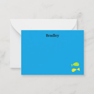 Cute green and yellow fishes on blue card